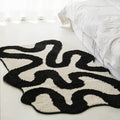 Black Swirl Tufted Area Rug