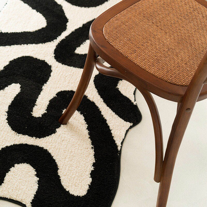 Black Swirl Tufted Area Rug
