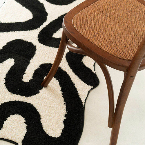 Black Swirl Tufted Area Rug