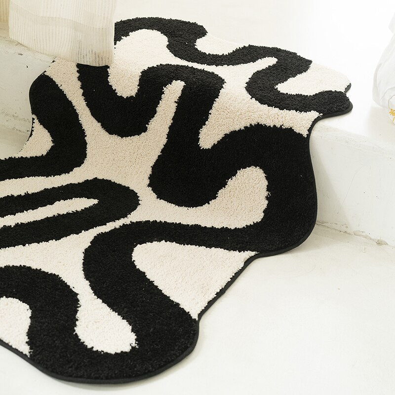 Black Swirl Tufted Area Rug