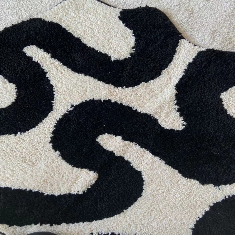 Black Swirl Tufted Area Rug