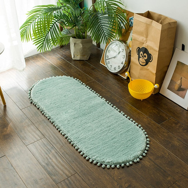 Pom-pom Trimmed Oval Anti-skid Rug Mint