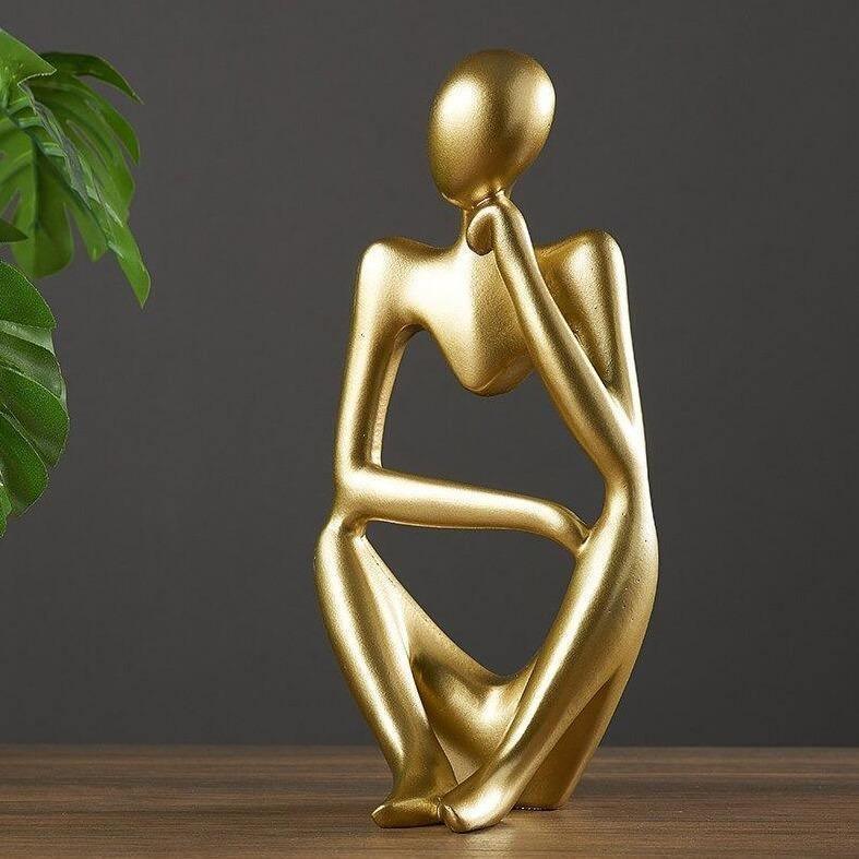 Mindful Abstract Statue Gold Head on Knuckle