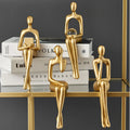 Golden Abstract Figurines